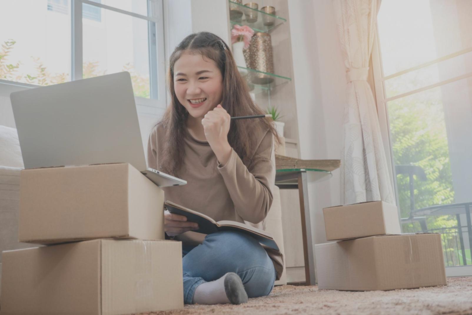 Student analyzing SEO audit data on multiple screens during practical workshop session